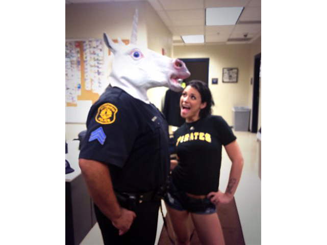 641px x 481px - Masked Pennsylvania cop in trouble for pic with porn star