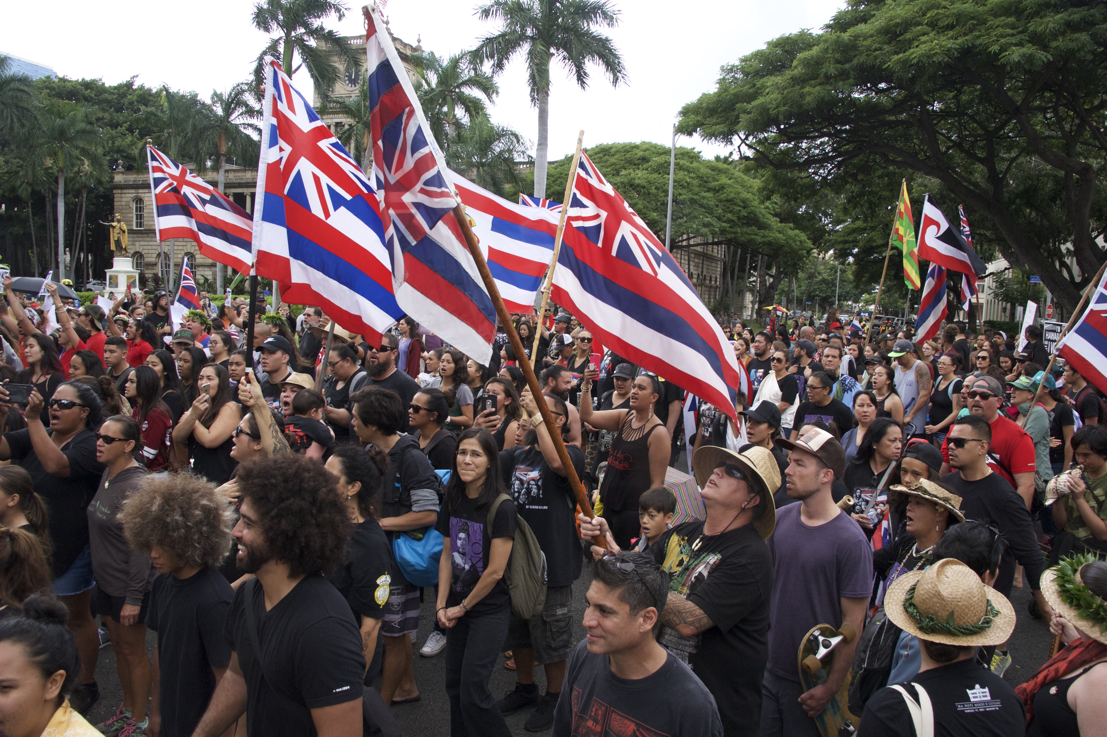 Thousands march to mark the overthrow of the Hawaiian monarchy