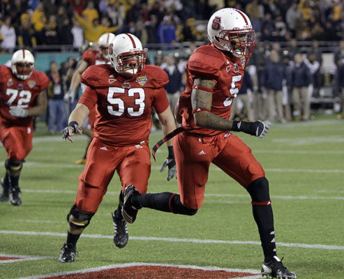 NC State tops West Virginia 23-7 in Champs Sports Bowl