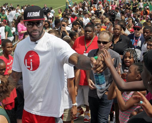 Lebron james giving back to hot sale the community