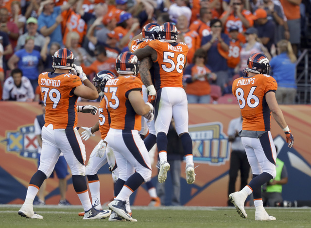 Miller's sack-strip leads Broncos past Colts 34-20