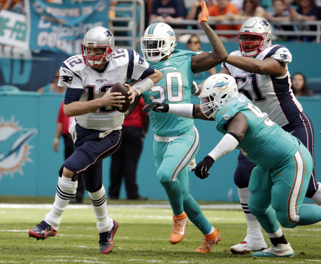 Brady throws for 3 scores to help Pats beat Miami 35-14