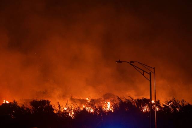 Brush fire closes Hana Highway; 5 homes evacuated | Honolulu Star ...