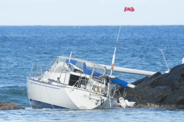 Sailboat on first journey with new owner runs aground at Magic Island ...