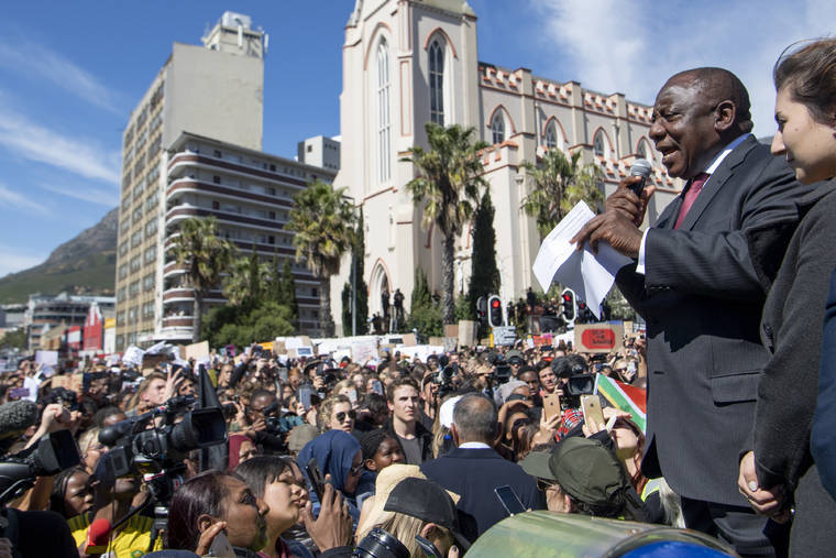 ASSOCIATED PRESS / SEPT. 5
                                South African President, Cyril Ramaphosa addresses protesters against gender-based violence outside parliament in Cape Town, South Africa, Prince Harry and his wife, Meghan, along with their infant son, Archie, are making their first official tour as a family, starting Monday in a troubled South Africa whose president says women and children are “under siege” by shocking violence.