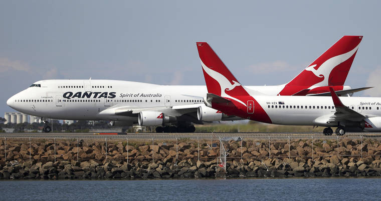 ASSOCIATED PRESS
                                Two Qantas planes taxi on the runway at Sydney Airport in Sydney, Australia, in 2015. Qantas has completed the first non-stop commercial flight from New York to Sydney, which was used to run a series of tests to assess the effects of ultra-long-haul flights on crew fatigue and passenger jetlag.