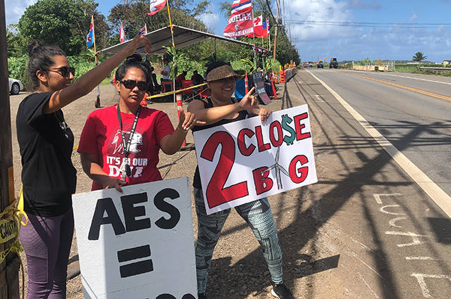 Kahuku wind farm opponents protest along Kamehameha Highway 