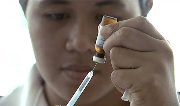 NEWSHUB VIA ASSOCIATED PRESS
                                A New Zealand health official prepared a measles vaccination at a clinic, today, in Apia, Samoa. Authorities said today that a measles epidemic sweeping through Samoa continues to worsen with the death toll rising to 25, all but one of them young children.