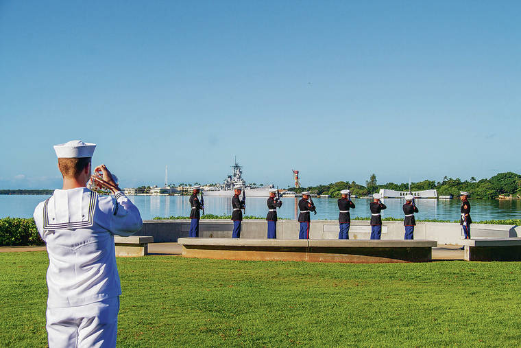 DENNIS ODA / DODA@STARADVERTISER.COM
                                The U.S. Marine Corps did the rifle salute as the Pacific Fleet Band played Echo Taps at the end of the ceremony on Saturday. The USS Missouri and Arizona Memorial are seen are in the background.