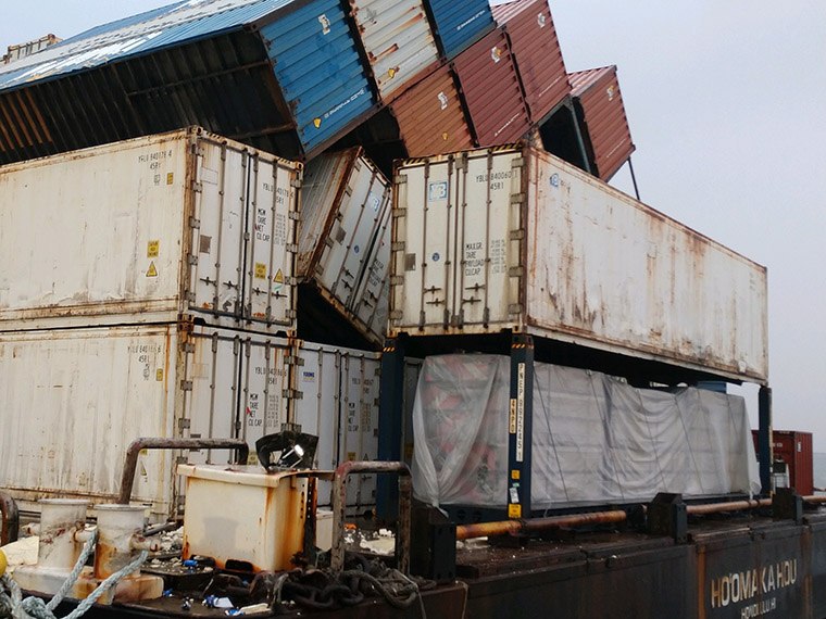 Coast Guard investigating after 21 containers fall off Young Brothers ...