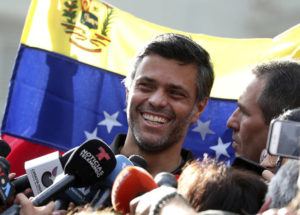 ASSOCIATED PRESS / 2019
                                Venezuelan opposition leader Leopoldo Lopez smiles during a press conference at the gate of the Spanish ambassador’s residence in Caracas, Venezuela. Lopez left the residence where he had been a guest since April 30, 2019 and is leaving Venezuela people close to the opposition leader said.