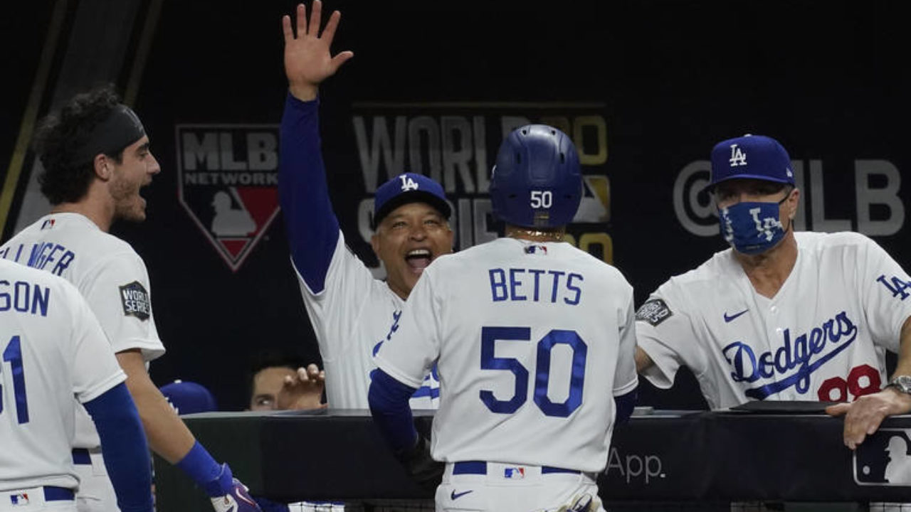 Boston Red Sox Mookie Betts holds up the Commissioner's Trophy as the Sox  celebrate after beating the Los Angeles Dodgers in game 5 of the MLB 2018 World  Series at Dodger Stadium