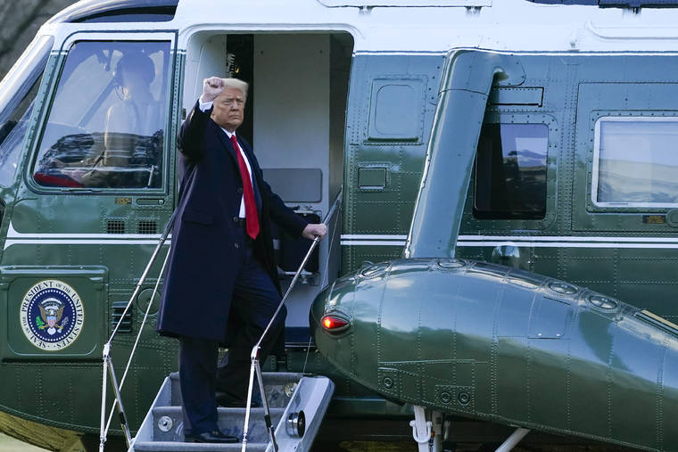 ASSOCIATED PRESS
                                President Donald Trump gestured as he boarded Marine One on the South Lawn of the White House, today, in Washington. Trump headsed to his Mar-a-Lago Florida Resort.