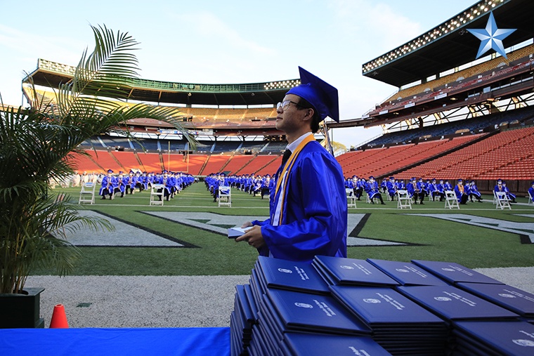 Moanalua High School seniors receive their diplomas at Aloha Stadium
