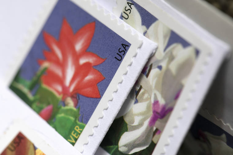 U.S. Postal Service looks to raise cost of firstclass stamp to 58