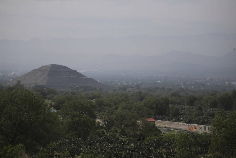 ASSOCIATED PRESS
                                Construction of a private building project is seen on the outskirts of Teotihuacan, just north of Mexico City, Wednesday.