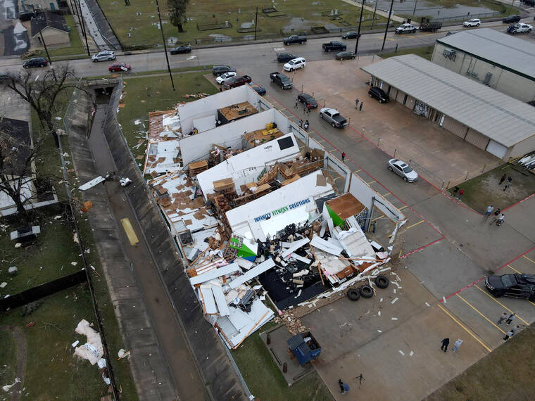 ASSOCIATED PRESS A drone photo shows the extensive damage from overnight storms today in Humble, Texas. Powerful storms hit throughout southeast Texas overnight, bringing flash floods and possible tornadoes.