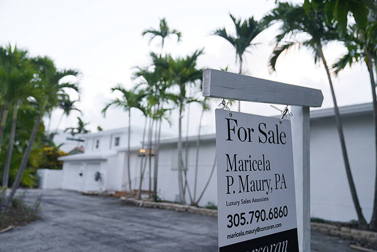 ASSOCIATED PRESS / OCT. 7
                                A waterfront home is shown for sale in Surfside, Fla.