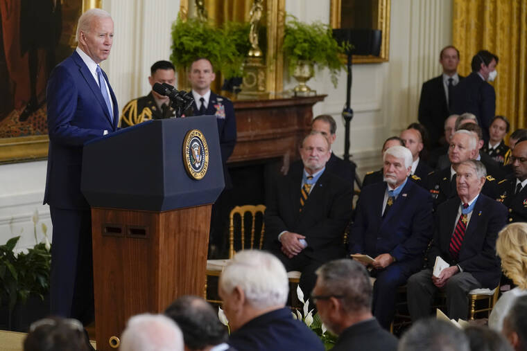 ASSOCIATED PRESS President Joe Biden speaks during a Medal of Honor ceremony in the East Room of the White House, today, in Washington.