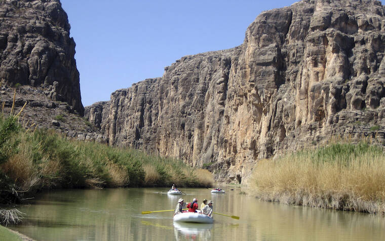 ASSOCIATED PRESS / 2011 Rafts piloted by guides from Far Flung Outdoor Center of Terlingua, Texas, as they emerge from Heath Canyon, carved by the Rio Grande through Big Bend National Park, Texas.
