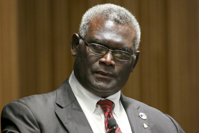 ASSOCIATED PRESS
                                Manasseh Sogavare, Prime Minister of Solomon Islands attends a Lowy Institute event in Sydney on Aug. 14, 2017.