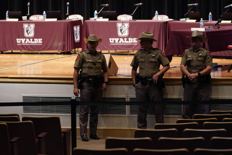 ASSOCIATED PRESS
                                Texas Department of Safety Troopers stand by for a meeting of the Board of Trustees of Uvalde Consolidated Independent School District in Uvalde, Texas. The board is expected to hold termination hearings to decide the employment fate of Uvalde School District Police Chief Pete Arredondo.