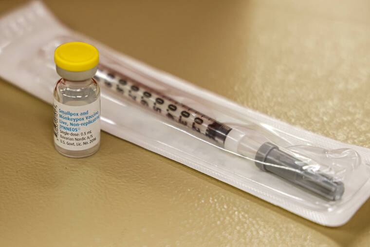 ASSOCIATED PRESS
                                A vial containing the monkeypox vaccine and a syringe is set on the table at a vaccination clinic run by the Mecklenburg County Public Health Department in Charlotte, N.C., Aug. 20. At-risk people who received just one dose of the monkeypox vaccine appeared to be significantly less likely to get sick from the virus, public health officials announced today, even as they urged a second dose for full protection.