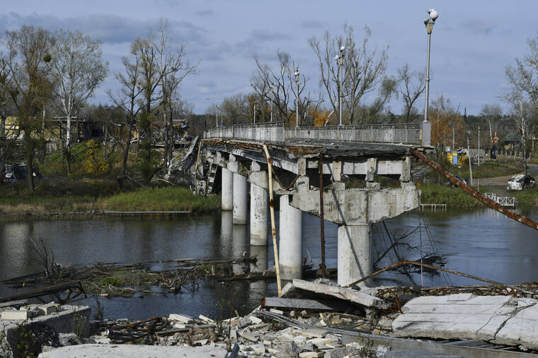 ASSOCIATED PRESS / OCT. 29
                                A view of a destroyed bridge across the Siverskyi-Donets river in the liberated town of Sviatohirsk, Donetsk region, Ukraine.