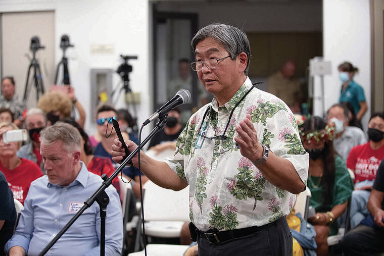 GEORGE F. LEE / GLEE@STARADVERTISER.COM
                                Ernie Lau, manager and chief engineer at the Honolulu Board of Water Supply, addressed the panel with his concerns.