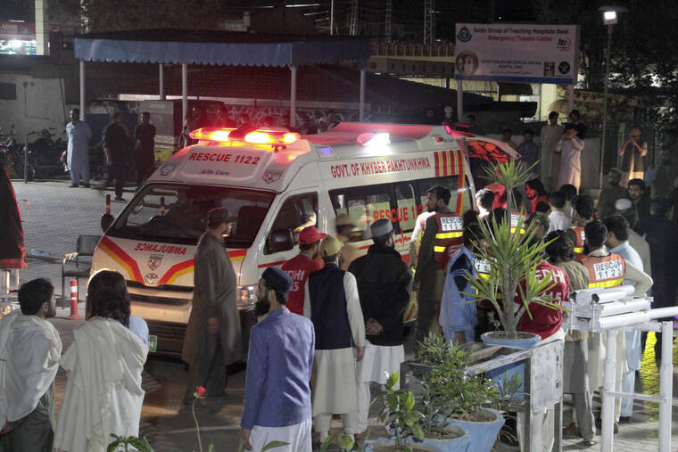 NAVEED ALI / AP
                                Rescue worker unload earthquake victims from an ambulance at a hospital in Saidu Sharif, a town Pakistan’s Swat valley, Tuesday, March 21. A magnitude 6.5 earthquake rattled much of Pakistan and Afghanistan on Tuesday, sending panicked residents fleeing from homes and offices and frightening people even in remote villages.