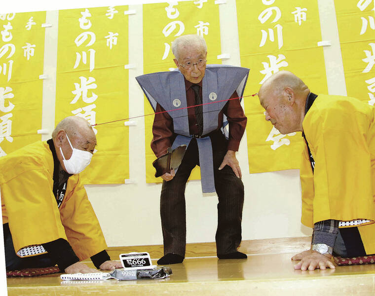 JAPAN NEWS-YOMIURI
                                Participants in a bald head contest faced off in a tug-of-war with suction cups attached to their heads in Yokote, Akita prefecture, in late January.