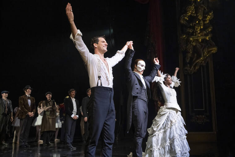 CHARLES SYKES/INVISION/AP / APRIL 16
                                “The Phantom of the Opera” cast appears at the curtain call following the final Broadway performance at the Majestic Theatre in New York.