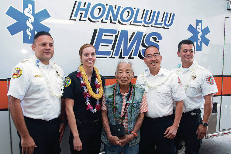 Man, 95, reunites with Honolulu paramedics who saved his life ...