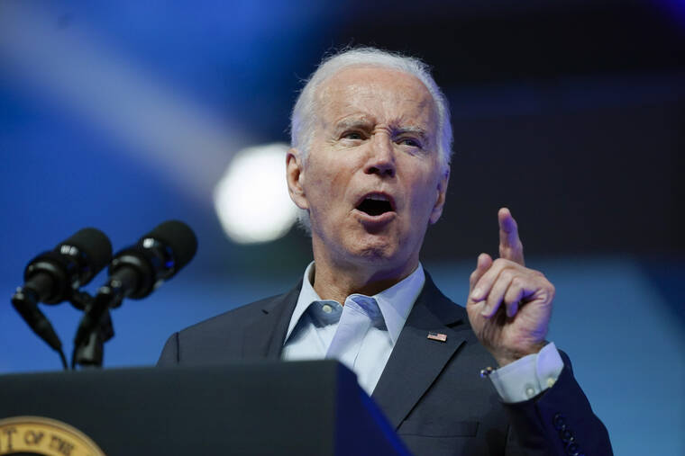 Biden strikes economic populist tone during first big campaign rally ...