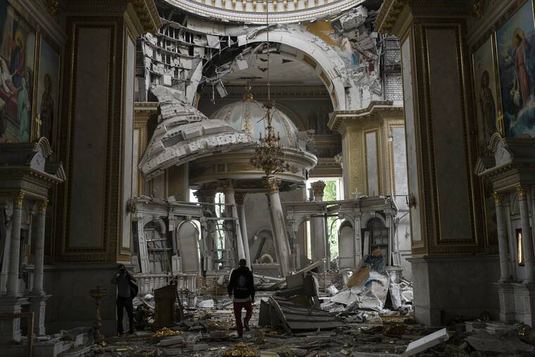 ASSOCIATED PRESS
                                Church personnel inspect damages inside the Odesa Transfiguration Cathedral in Odesa, Ukraine, Sunday, July 23, following Russian missile attacks.