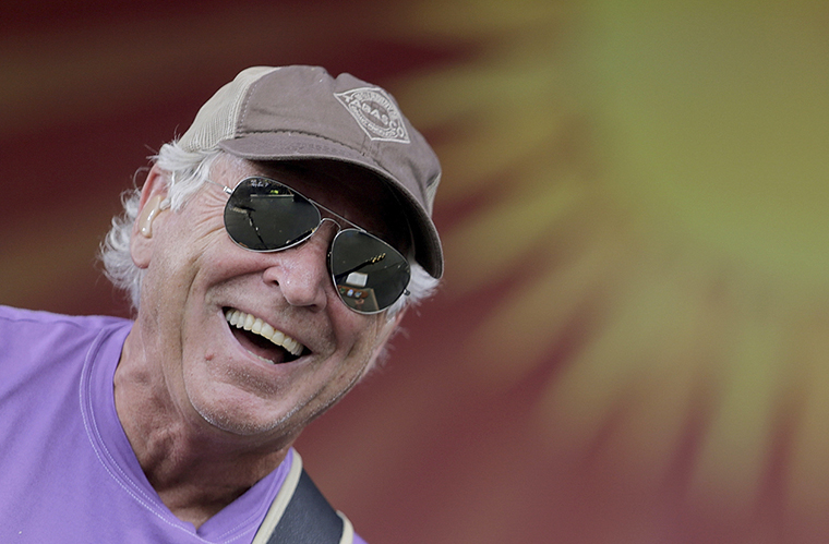 FILE - Jimmy Buffett thanks the capacity crowd at the Coffee