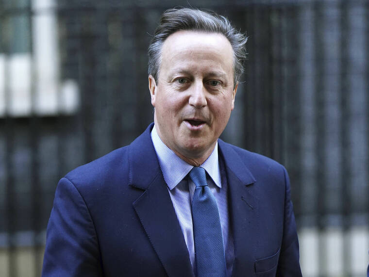 JAMES MANNING/PA VIA ASSOCIATED PRESS
                                Britain’s former prime minister David Cameron leaves Downing Street, in London, today. British Prime Minister Rishi Sunak, today, fired Home Secretary Suella Braverman, a divisive figure who drew anger for accusing police of being too lenient with pro-Palestinian protesters. In a highly unusual move, former Prime Minister David Cameron was named foreign secretary.