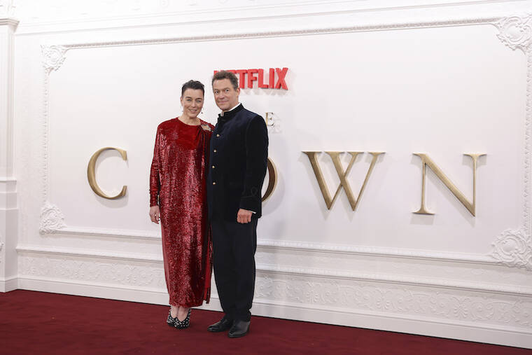 VIANNEY LE CAER/INVISION/AP / DEC. 5
                                Olivia Williams, left, and Dominic West pose for photographers upon arrival at the premiere for ‘The Crown’ season 6 finale, in London.