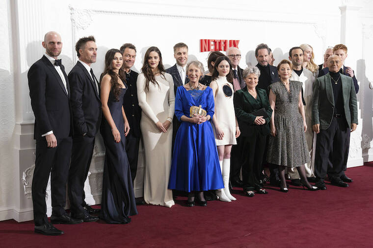 SCOTT GARFITT/INVISION/AP / DEC. 5
                                James Murray, from left, Beau Gadsdon, Dominic West, Meg Bellamy, Ed McVey, Marcia Warren, Claudia Harrison, Madeleine Arthur, Jonathan Pryce, Imelda Staunton, Elizabeth Debicki, Lesley Manville, Bertie Carvel, Olivia Williams, Khalid Abdalla, Salim Daw, Sebastian Blunt and Luther Ford pose for photographers upon arrival at the premiere for ‘The Crown’ season 6 finale, in London.