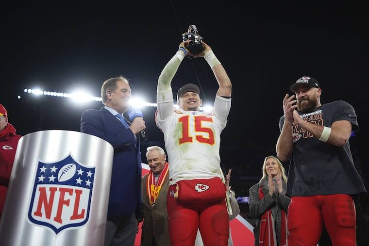 ASSOCIATED PRESS
                                Kansas City Chiefs quarterback Patrick Mahomes (15) holds up the Lamar Hunt Trophy next to Kansas City Chiefs tight end Travis Kelce (87) after the AFC Championship NFL football game against the Baltimore Ravens in Baltimore. The Chiefs won 17-10.