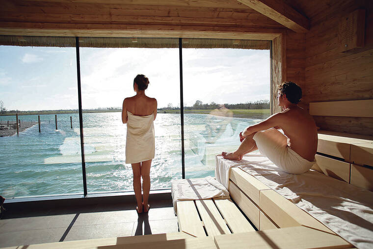 PETER RIGAUD / ST. MARTINS THERME & LODGE / NEW YORK TIMES
                                St. Martins Therme & Lodge in Frauenkirchen, Austria, looks out on a serene, shallow lake.