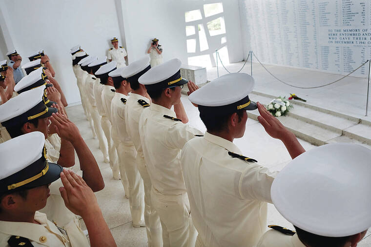 KEVIN KNODELL / KKNODELL@STARADVERTISER.COM
                                Cadets saluted as they paid respect at the USS Arizona Memorial on Thursday.