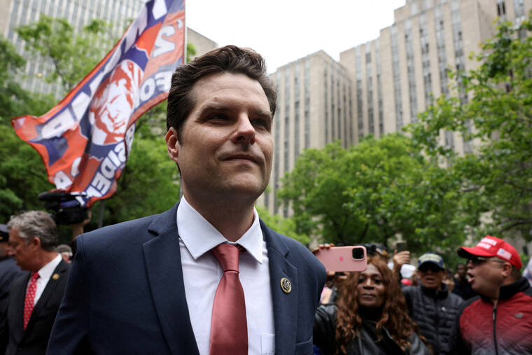 REUTERS/ANDREW KELLY/FILE PHOTO
                                U.S. Representative Matt Gaetz (R-FL) walks following a press conference after attending the trial of former President Donald Trump for allegedly covering up hush money payments linked to an extramarital affair with Stormy Daniels, at Manhattan Criminal Court in New York City, on May 16. A three-year U.S. House probe into allegations of ethical lapses including sexual misconduct and illicit drug use by Republican Representative Matt Gaetz will expand to investigate whether he tried to obstruct the inquiry, the committee leading it said on Tuesday.