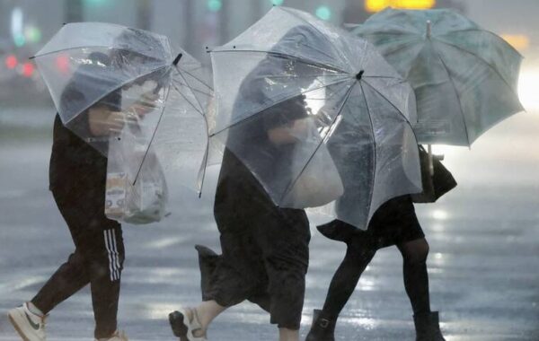 Shanshan drenches southern Japan, disrupting train and air travel