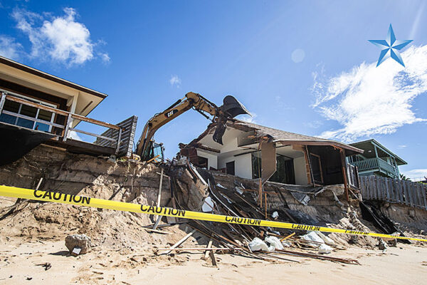 Demolition begins on eroded North Shore home