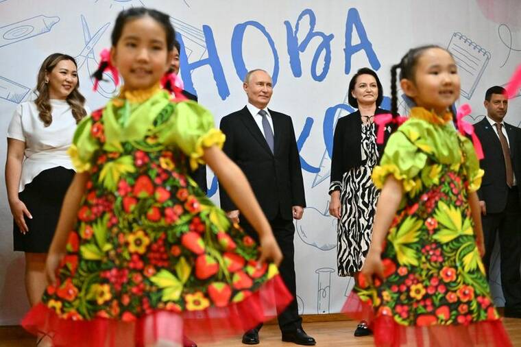 SPUTNIK/KRISTINA KORMILITSYNA/KREMLIN VIA REUTERS
                                Russian President Vladimir Putin and Mongolian President Ukhnaagiin Khurelsukh visit a school of the local branch of the Plekhanov Russian University of Economics, in Ulaanbaatar, Mongolia.