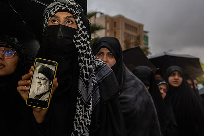 ARASH KHAMOOSHI / NEW YORK TIMES
                                People gather in Tehran, Iran, to mourn the Hezbollah leader Hassan Nasrallah today. The death of Nasrallah is a major escalation in Israel’s rapidly expanding campaign against the Iran-backed group.