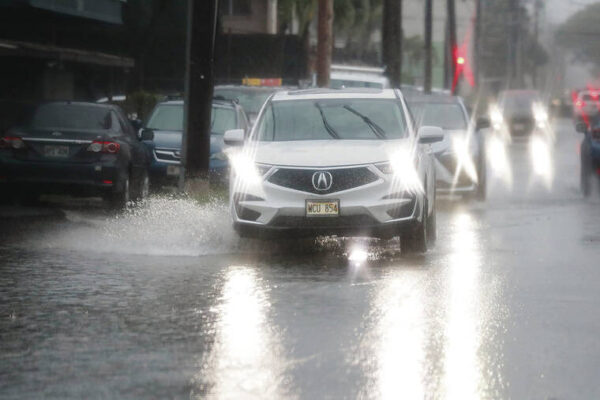 Rain, wind cause power outages, flooding, flight disruptions