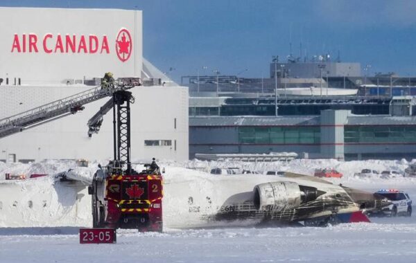 Delta plane flips on landing at Toronto airport, injuring 18