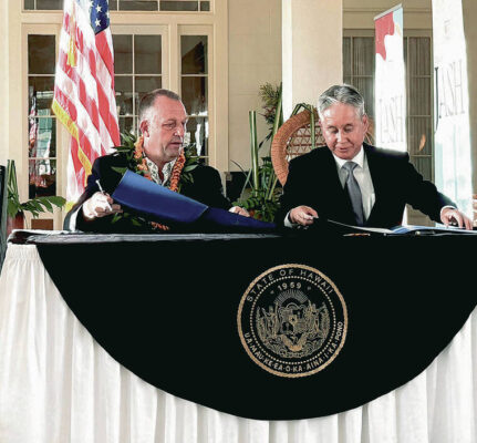 Gov. Green, Japanese official sign pact to ease entry for visitors